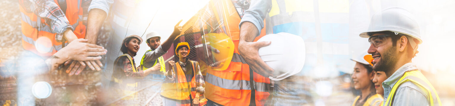 Equipe de trabalhadores com capacetes e coletes de segurança